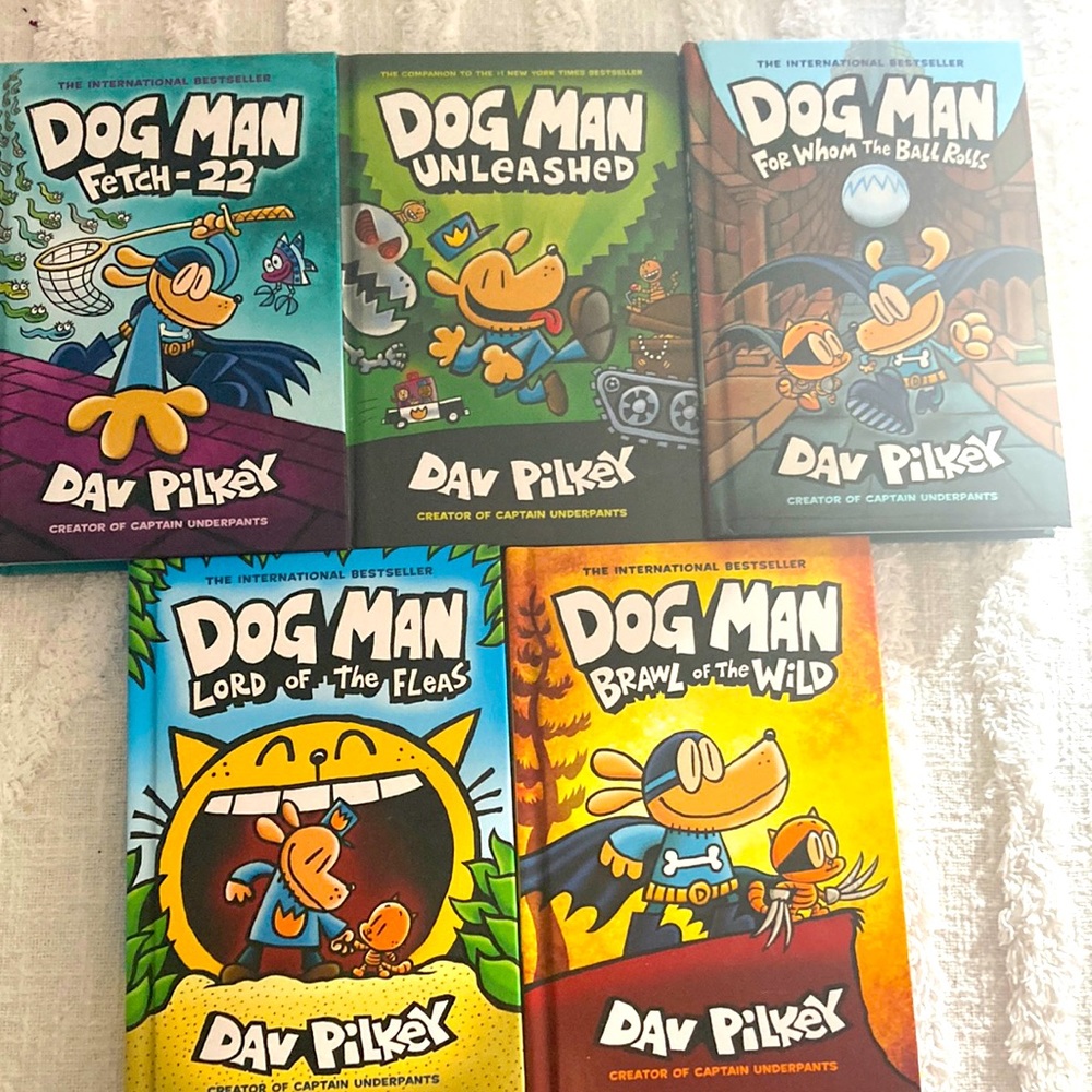 Five dog man books brand new never been used before